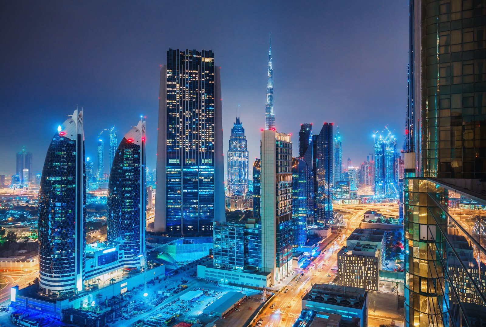 Dubai skyline at night showing Index Tower in the DIFC financial district